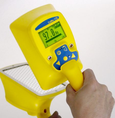 A hand-held contamination monitor