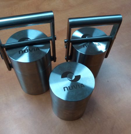 Three lead containers for radioactive materials